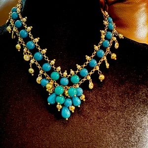 Beautiful turquoise, beaded necklace. Sits close to the neck. Easy to clasp